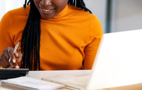 Woman using a calculator