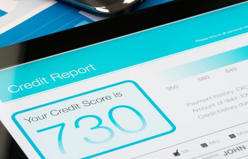 A credit report is displayed on a computer tablet--monitoring credit report can help protect credit score during the pandemic.