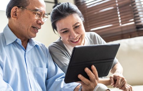 Couple looking at tablet