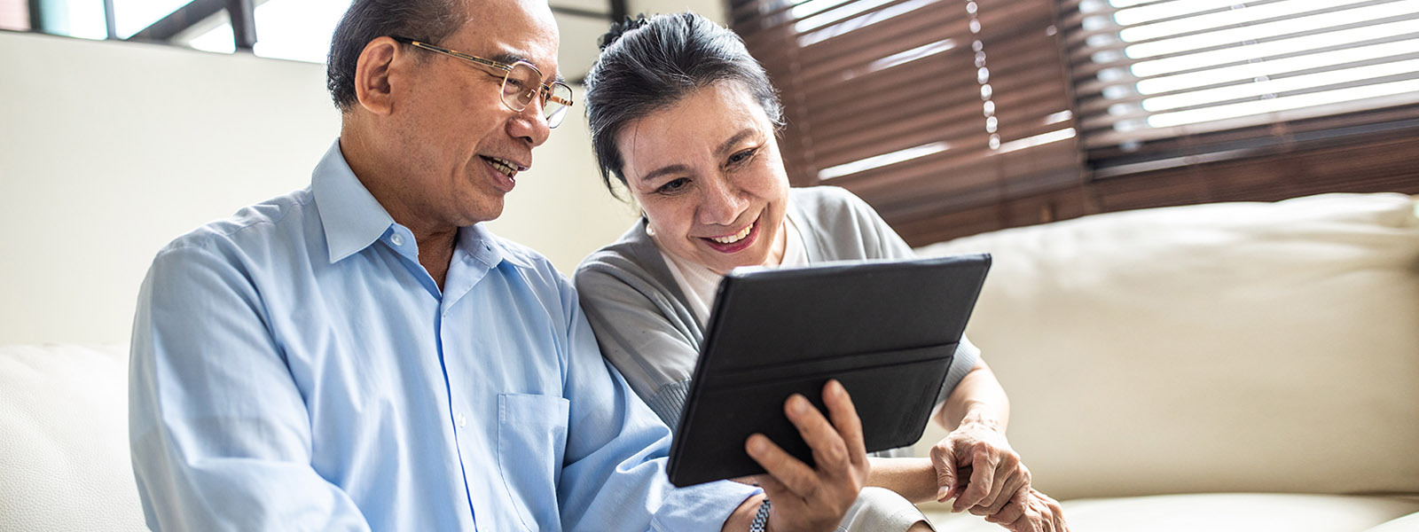 Couple looking at tablet