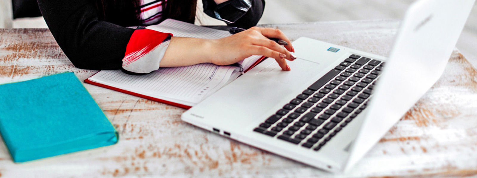 Woman searching online on a laptop