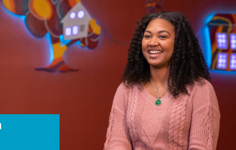 Makayla discussing Black History Month. There's a Great Place to Work logo in the upper right corner of her picture and text in a blue box in the lower left corner: Makayla Gambrell, Finance Manager