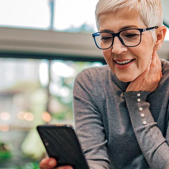 Woman looking at her smartphone