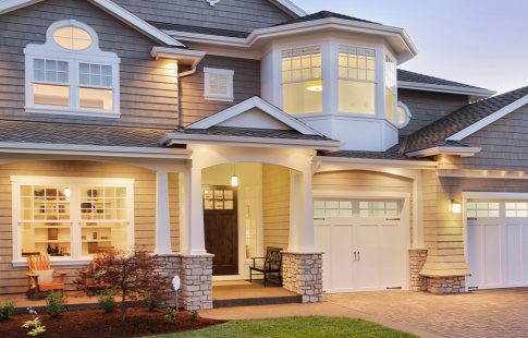 Gray two-story house. Lead image for article on recasting a mortgage.