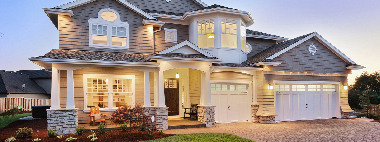 Gray two-story house. Lead image for article on recasting a mortgage.